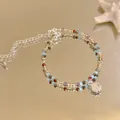 Beaded bracelet with natural stones and shell pendant in a vacation style design - Bracelet / Blue Shell Style 20