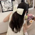 Elegant cream oversized bow hair clip accessory in a minimalist Korean style for women - Large Bow Hair Clip / Light Yellow