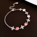 Elegant vintage silver bracelet featuring faceted pink crystals and gothic cross charms. - Cross Bracelet / Silver-Pink