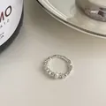 Elegant silver textured ring featuring delicate pearl accents for a modern chic style - Irregular Artificial Pearl Style (5714746783662) / Silver