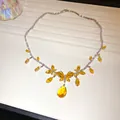 Elegant vintage silver necklace featuring pear-cut and marquise yellow crystals - Butterfly Necklace / Yellow