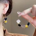 Harzperlen Creolen im Retro-Maillard-Stil mit goldfarbenem Draht für Damen - Ohrring Nr. 37 – Gold – Grau – Schwarz