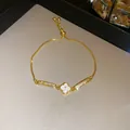 Elegant adjustable 18K gold plated four-leaf clover bracelet with shell inlay and zircons - Adjustable Clover Style (1#) / Gold