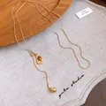 Vintage gold necklace with an elegant oval amber resin pendant and small metal ball - Water Drop Style / Brown