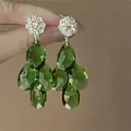Retro vintage style green drop earrings with crystal floral studs and faceted teardrops - Silver Earring Post Style / Green