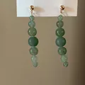 Elegant vintage green jade bead dangle earrings with gold ball studs macro detail - Silver Earring Post Style / Gold Green Combination
