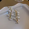 Elegant French style gold-tone dangle earrings featuring clusters of white faux pearls - 33# Ear Hooks - White Pearl Tassels
