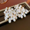 Elegant French style pearl tassel drop earrings with gold-tone hardware for women - 60# Silver Needle - Eco-friendly - Gold - White Teardrop