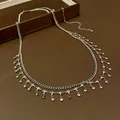 Vue détaillée de la chaîne de taille argentée à double couche avec pampilles strass - Style Double Couche Gland / 115cm / Argent