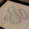 Elegante set di gioielli a forma di fiore argentato con collana, orecchini e bracciale con strass - Set da 3 Pezzi (Collana+Orecchini+Bracciale) / Argento