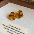 Orecchini geometrici esagonali in resina ambrata in stile vintage Maillard con bordo oro - Stile Geometrico Esagonale (5944763480745)