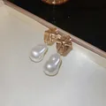 French style irregular gold metal stud earrings with elegant baroque pearl drop - 9 Silver Needle - Gold