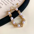 Elegant golden bracelet featuring white pearls and sparkling crystals on a vintage background - 55# Bracelet / Gold-Flower
