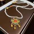 Dettaglio di una collana cinese con lucchetto della pace dorata e perle - 3# Collana-Serratura di Sicurezza (Oro Sabbia)