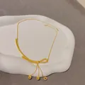 Elegante collana a nastro placcata in oro con nappine di perle cave in stile cinese moderno - 27# Collana-Fiocco (Placcato in Oro Vero)