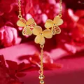 Elegante collana a farfalla placcata in oro con ali testurizzate e pendenti in stile cinese - 61# Collana-Fiore (Placcato in Oro Vero)
