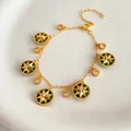 Elegant gold starburst charm bracelet with green enamel and sparkling zircon stones - 26# Bracelet (Green Star)