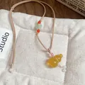 Collana con ciondolo a forma di zucca stile cinese moderno con cordino beige - 64 Collana-Marrone-Giallo-Zucca