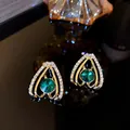 Elegant vintage gold finish earrings with emerald green stone and zircon accents - Double Layer Hollow Frame Style (21#)