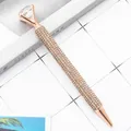 Elegante penna a sfera in oro rosa con grande diamante e corpo ricoperto di cristalli. - Punta a Proiettile da 1,0 mm / Oro rosa