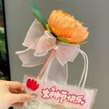 Penna a forma di fiore artificiale arancione con elegante fiocco rosa in confezione regalo - Penna a fiore di peonia arancione
