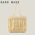 Bohemian hand-woven straw tote bag with stylish long fringe in natural beige color - Beige