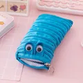 Blue monster shaped zipper pencil pouch featuring googly eyes and large capacity storage - Blue