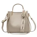 Elegant off-white large capacity bucket bag featuring a decorative FASHION ribbon strap - Off White