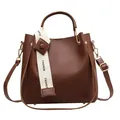 Stylish brown leather bucket bag with large capacity and detachable shoulder strap - Coffee