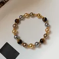 Bracelet vintage style Maillard avec œil de tigre et perles et fermoir magnétique - Marron