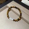 Vintage tiger eye bead bracelet with three white pearls in a jewelry display box - Tiger Eye Beaded Style (57#) / Brown