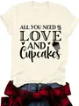 Detail view of cream T-shirt with 'Love and Cupcakes' graphic print. - Apricot