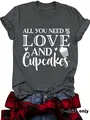 Close-up of women's charcoal grey t-shirt with 'Love and Cupcakes' white graphic print - Floral Black