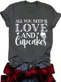 Close-up of women's charcoal grey t-shirt with 'Love and Cupcakes' white graphic print - Floral Black