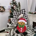 Detailed view of a cute bear Christmas tree ornament with a checkered bow - Bear Plush Toy