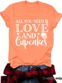Women's orange T-shirt with white 'Love and Cupcakes' graphic print - Heather Orange