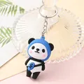 Close-up of a cute cartoon panda keychain featuring a blue hood and small fish bag - Fruit Panda - Fish Bag