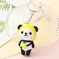 Close-up of a cute cartoon panda keychain with yellow hood and pineapple detail - Fruit Panda - Pineapple
