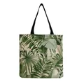 Close-up detail showing the vibrant tropical green leaf print on a canvas tote bag. - Artistic Tropical Green Leaf Print Style (hm4786)
