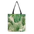 Durable canvas tote bag featuring a vibrant green monstera and palm leaf botanical print - High Saturation Tropical Green Leaf Print Style (hm4795)