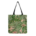 Tropical green leaf print canvas tote bag with black handles on soft pink background - Pink Background Tropical Green Leaf Print Style (hm4800)