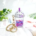 Cute Sakura cat milk tea cup keychain with purple oil liquid and sakura sequins decoration - Sakura Cat Purple