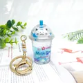 Cute Sakura cat milk tea cup liquid keychain with blue oil and cherry blossom sequins - Sakura Cat Sky Blue