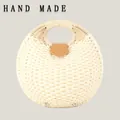 Fashionable round beige woven paper straw handbag with circle handle and leather trim - Upgraded Handle / White