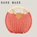 Fashionable round woven paper rope handbag with leather clasp in coral and cream color - Upgraded Handle / Red