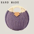 Handcrafted round woven handbag in purple and beige paper rope with a brown leather tab - Upgraded Handle / Purple