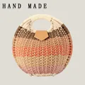 Handmade round straw woven handbag featuring colorful horizontal stripes and top handle - Upgraded Handle / Brown Orange Pink