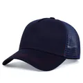 Close-up of a navy blue trucker hat with breathable mesh back and red contrast stitching. - Navy Blue