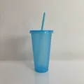 Detailed view of the blue glittery finish on a 24oz reusable plastic straw cup. - 24OZ/710ML / Light Blue (Glitter)