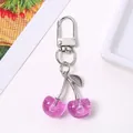 Cute shiny purple glitter cherry keychain charm for bags and keys fruit pendant - Silver Purple